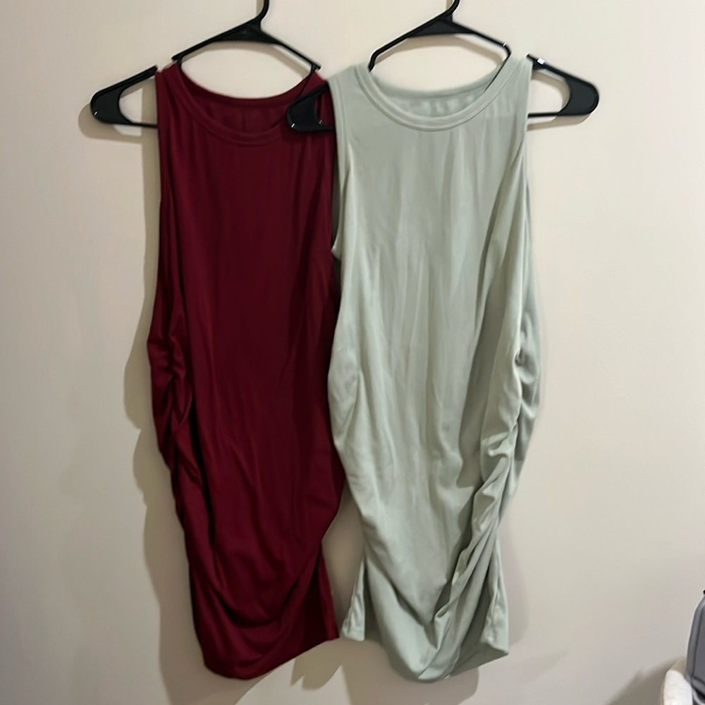 Two size large tight maternity dresses - barely worn